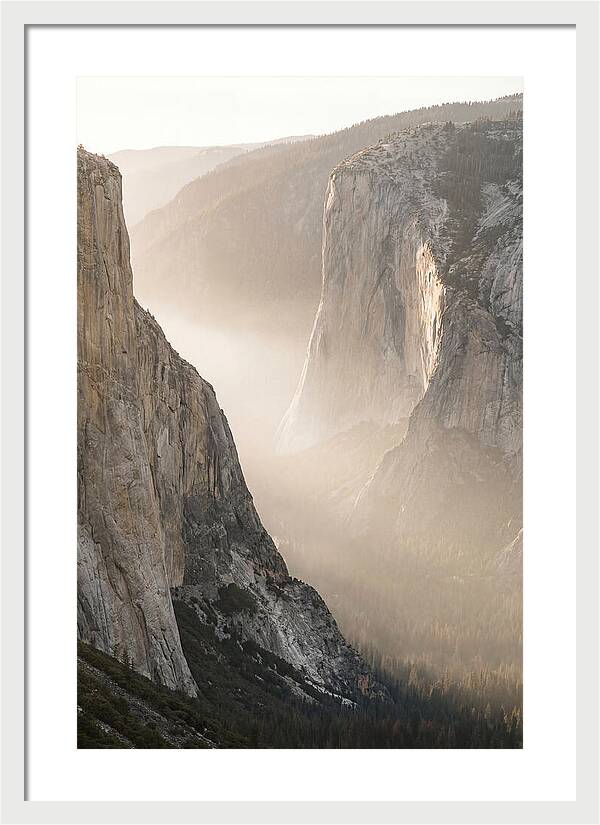 Misty Valley Between Towering Cliffs