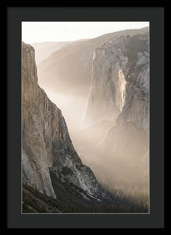 Misty Valley Between Towering Cliffs