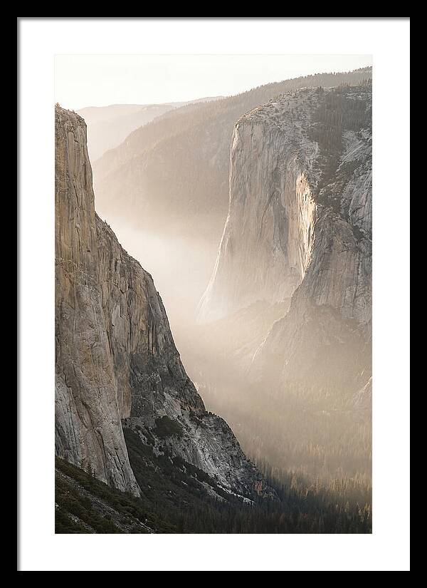 Misty Valley Between Towering Cliffs
