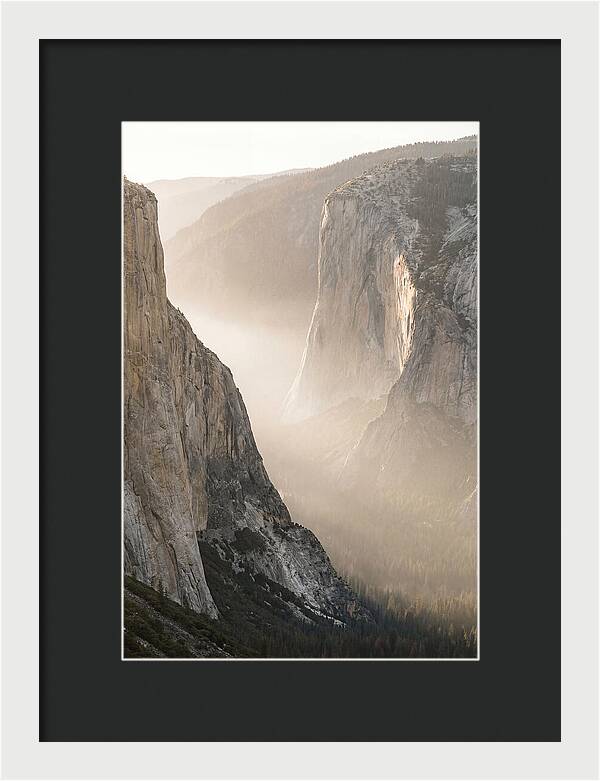 Misty Valley Between Towering Cliffs