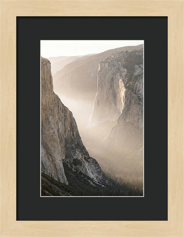 Misty Valley Between Towering Cliffs