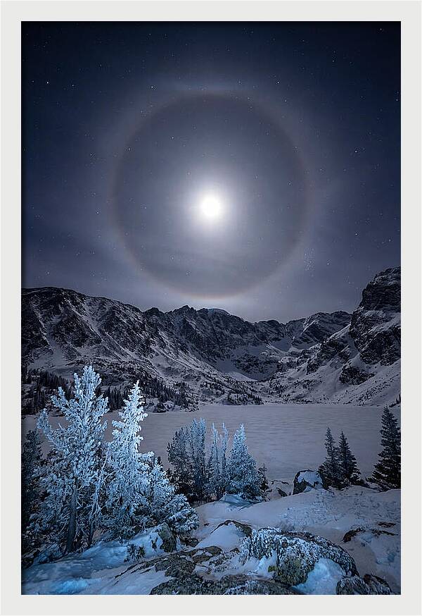 Moon Halo Over Frozen Landscape