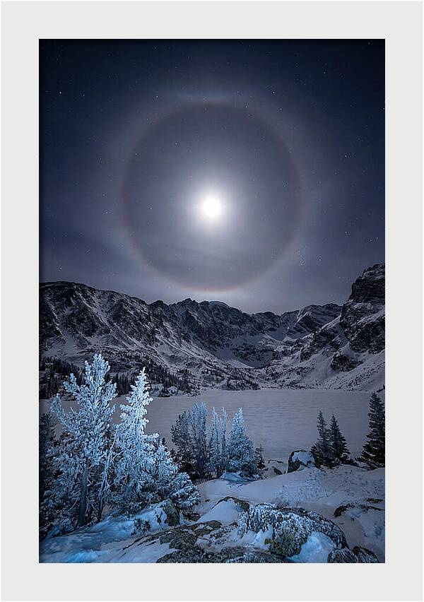 Moon Halo Over Frozen Landscape