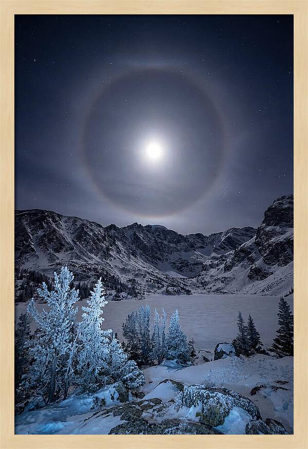 Moon Halo Over Frozen Landscape