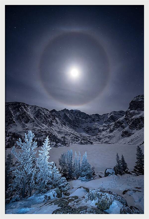Moon Halo Over Frozen Landscape