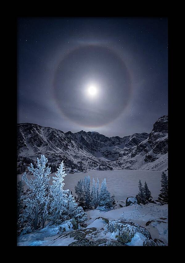 Moon Halo Over Frozen Landscape
