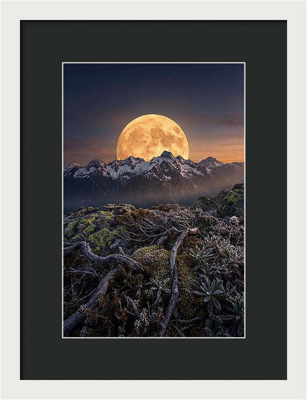 Moon Rising Over Majestic Peaks