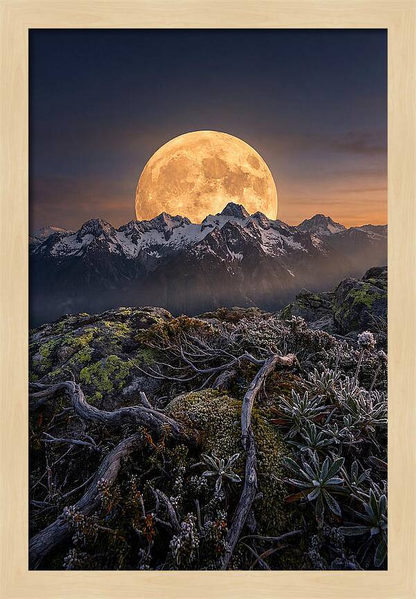 Moon Rising Over Majestic Peaks