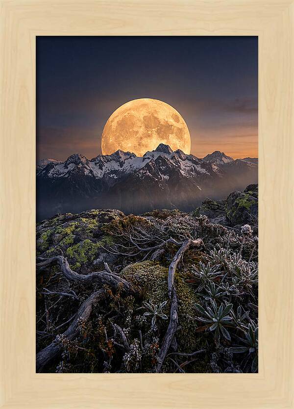 Moon Rising Over Majestic Peaks
