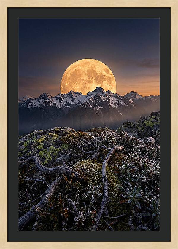 Moon Rising Over Majestic Peaks