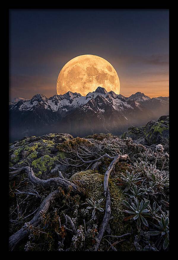 Moon Rising Over Majestic Peaks