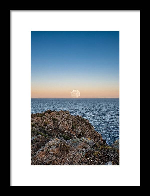 Moonrise Over Calm Sea