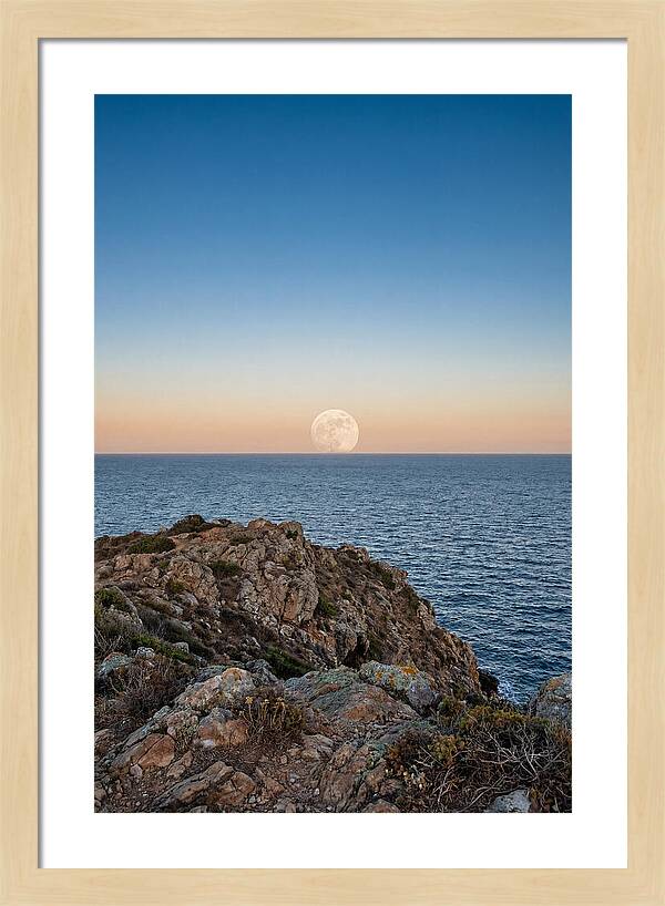 Moonrise Over Calm Sea