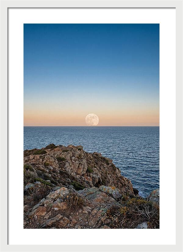 Moonrise Over Calm Sea
