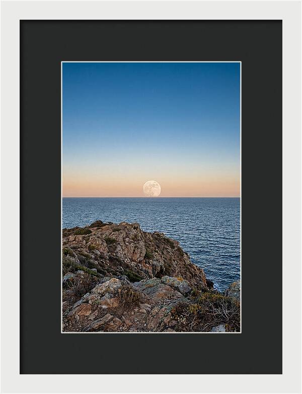 Moonrise Over Calm Sea