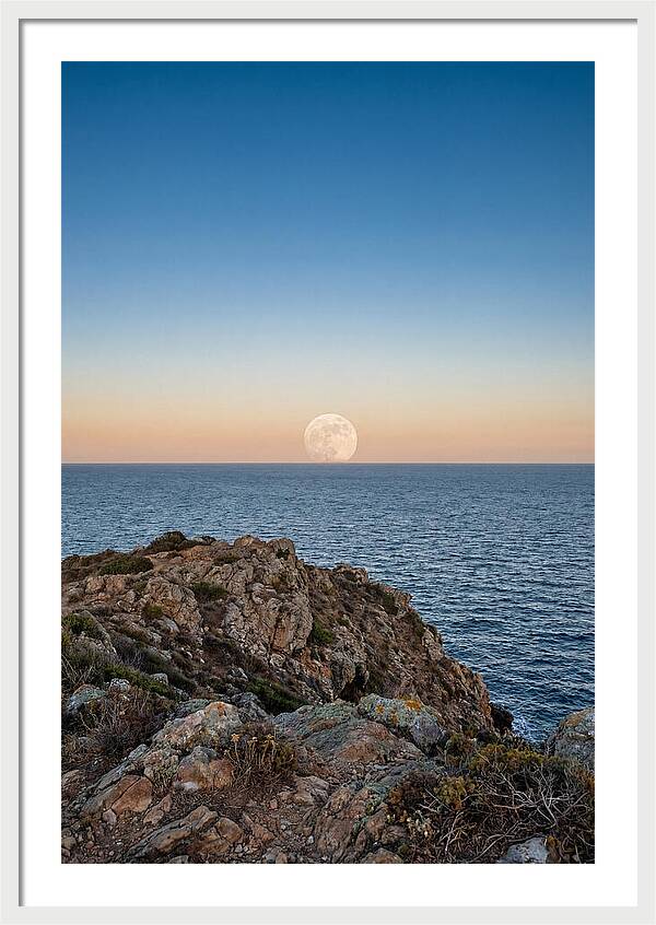 Moonrise Over Calm Sea