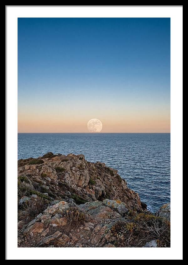 Moonrise Over Calm Sea