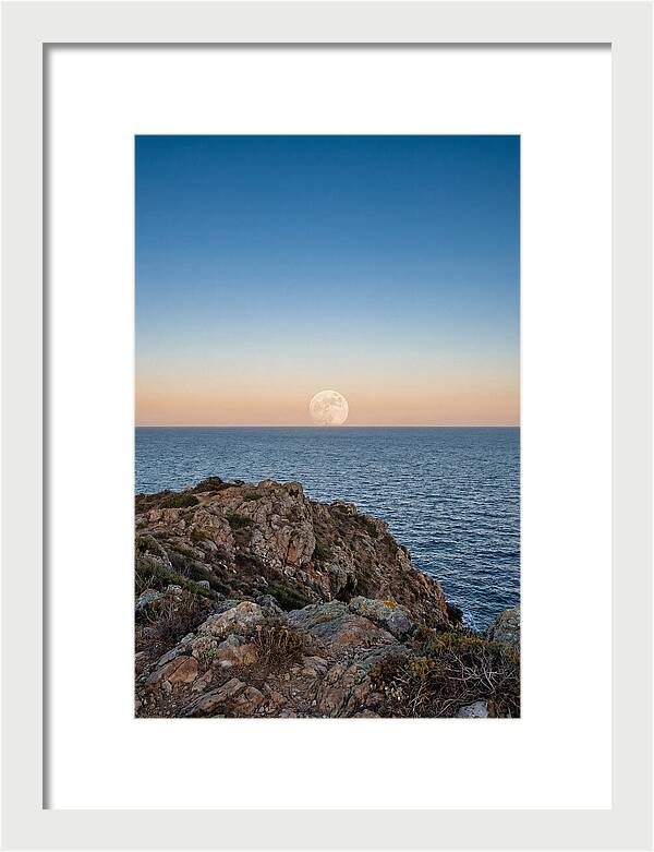 Moonrise Over Calm Sea