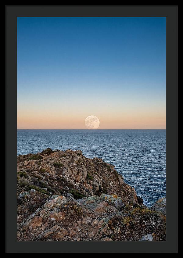 Moonrise Over Calm Sea