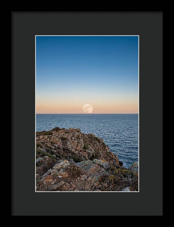 Moonrise Over Calm Sea