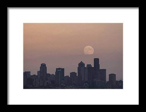 Moonrise Over City Skyline
