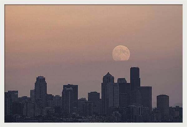 Moonrise Over City Skyline