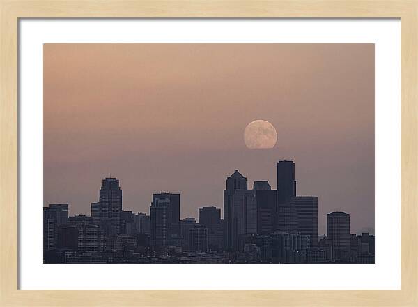 Moonrise Over City Skyline
