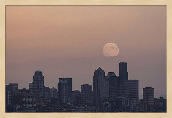 Moonrise Over City Skyline
