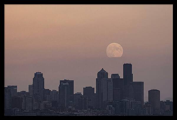 Moonrise Over City Skyline