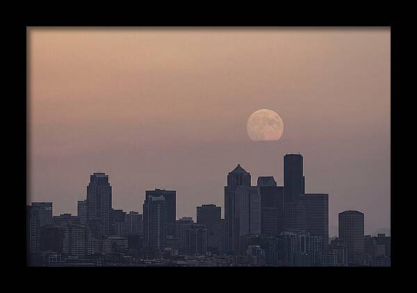 Moonrise Over City Skyline