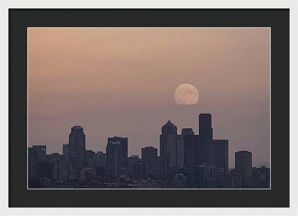 Moonrise Over City Skyline