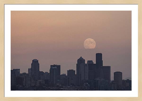 Moonrise Over City Skyline