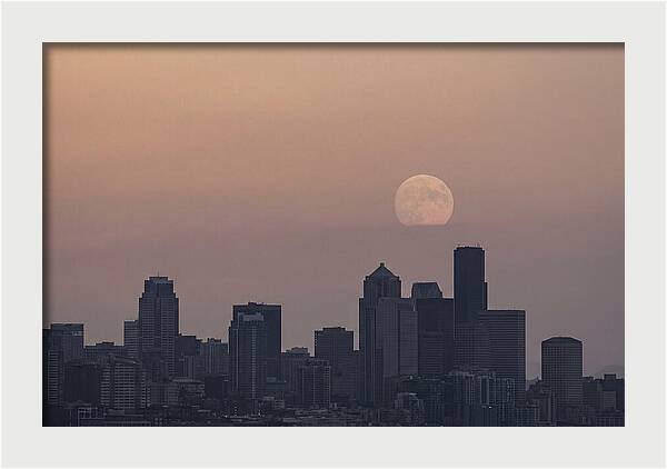 Moonrise Over City Skyline