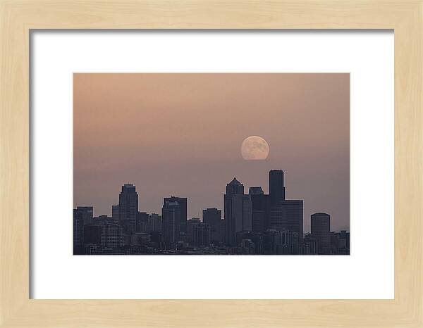 Moonrise Over City Skyline