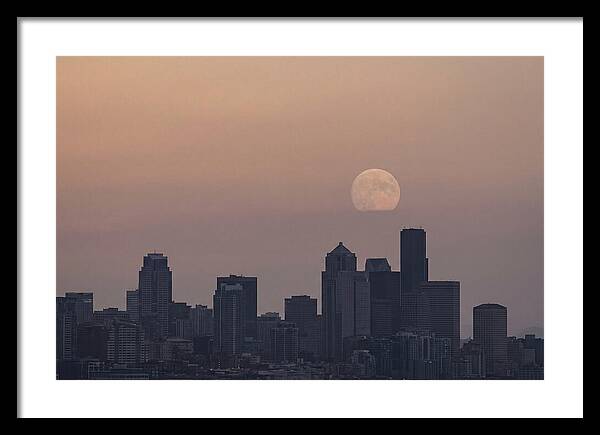 Moonrise Over City Skyline