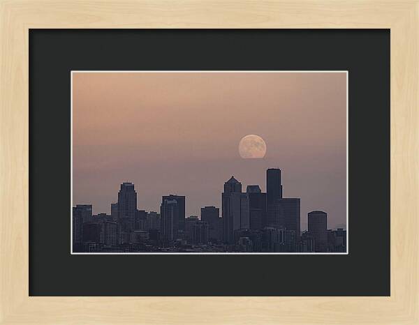 Moonrise Over City Skyline