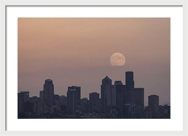 Moonrise Over City Skyline