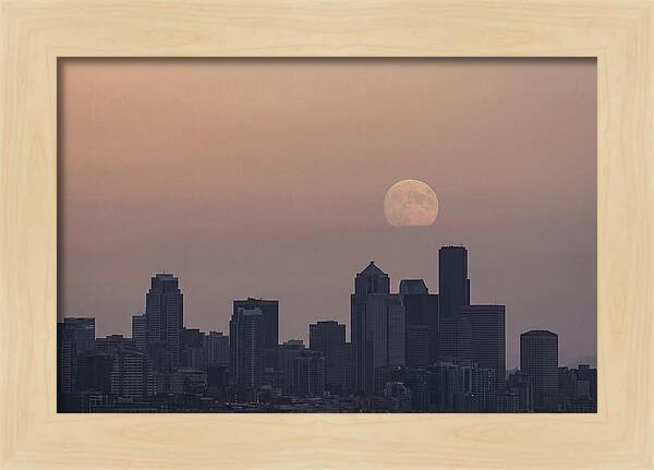 Moonrise Over City Skyline