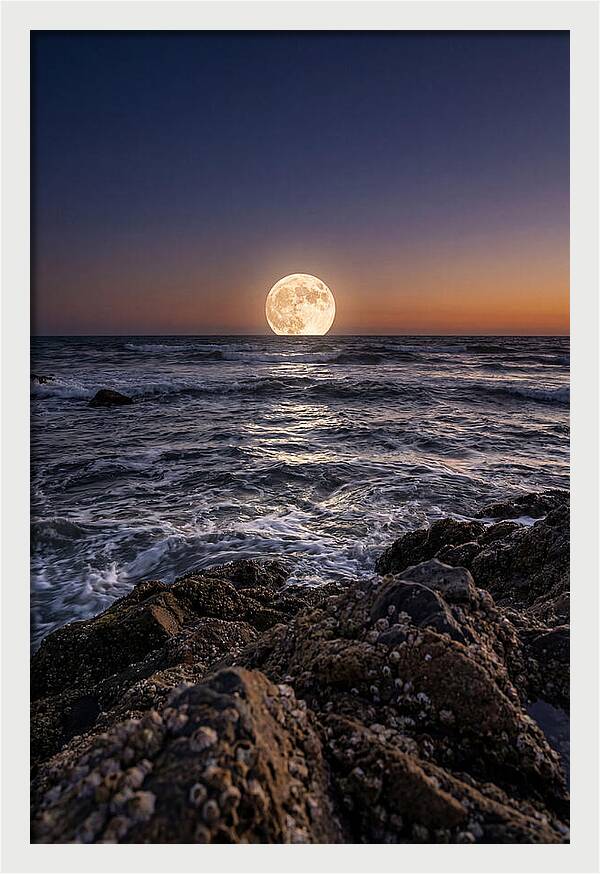 Moonrise Over Ocean Waves