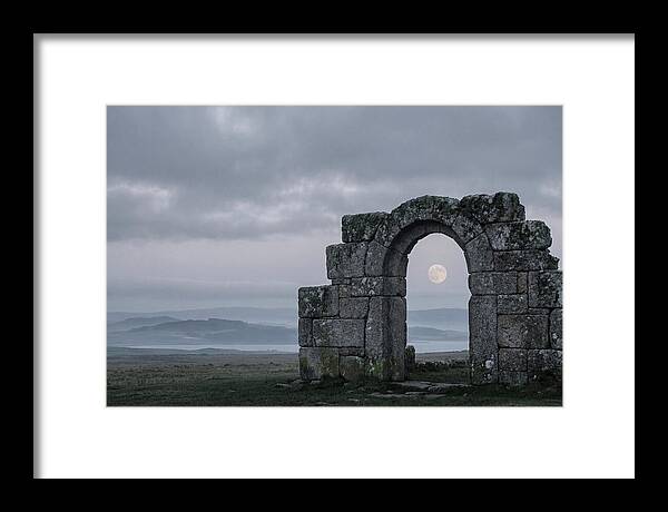 Moonrise Through Ancient Stone Doorway