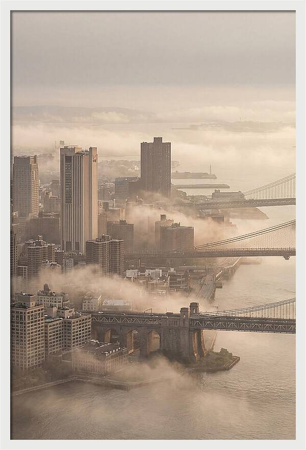 Morning Fog Lifting Over City Bridges