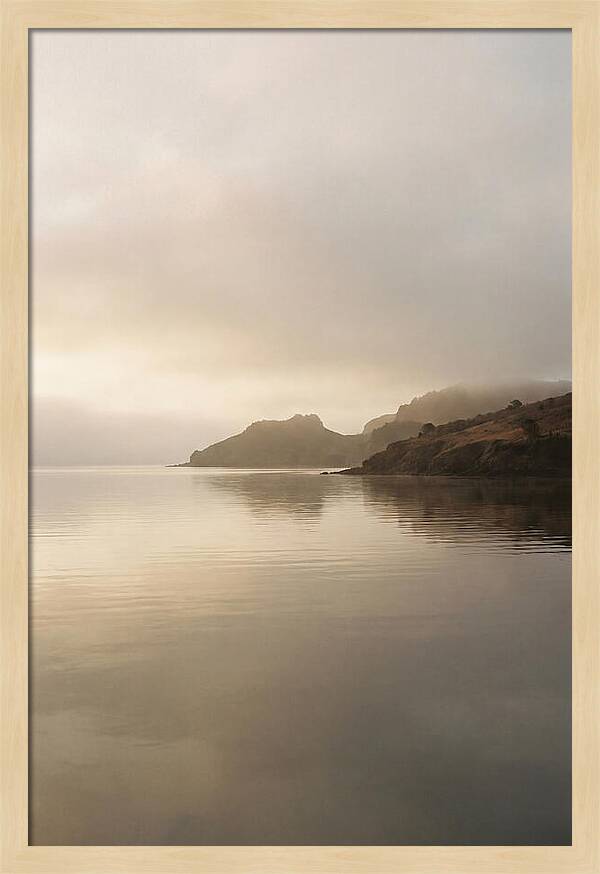 Morning Mist Over Glassy Coastal Bay
