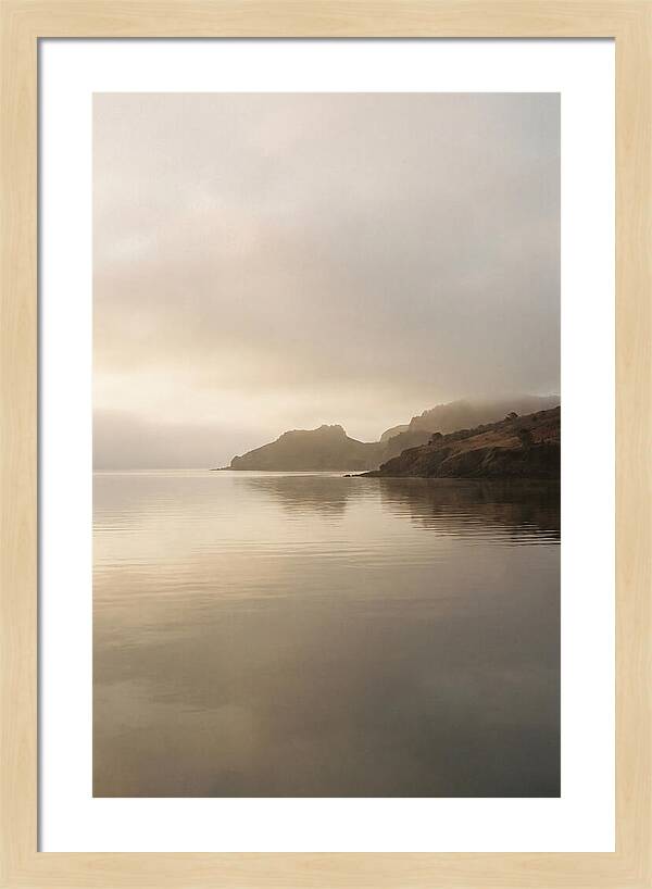 Morning Mist Over Glassy Coastal Bay