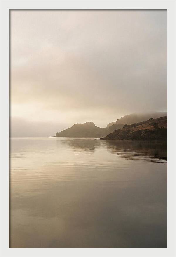 Morning Mist Over Glassy Coastal Bay