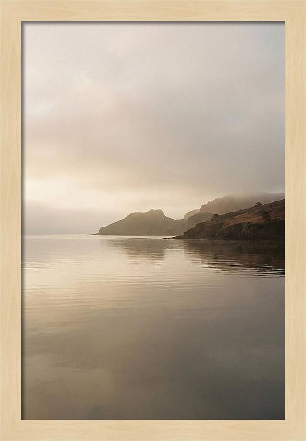 Morning Mist Over Glassy Coastal Bay