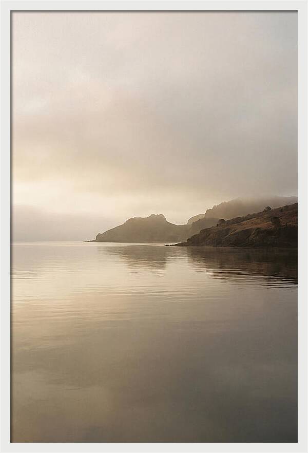 Morning Mist Over Glassy Coastal Bay