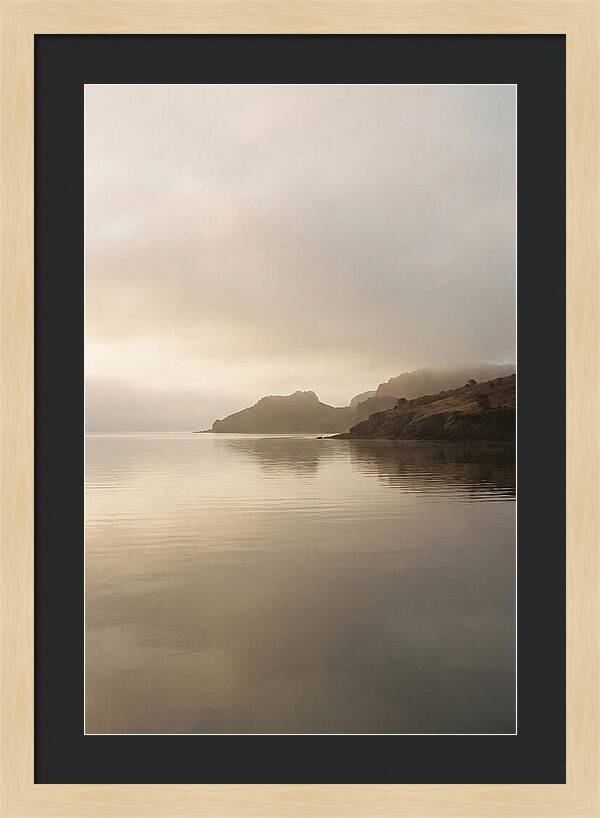 Morning Mist Over Glassy Coastal Bay