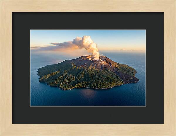 Mount Karthala Erupting Over Ocean