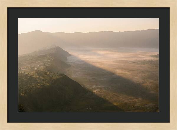 Mountain Shadow Stretching Across Valley