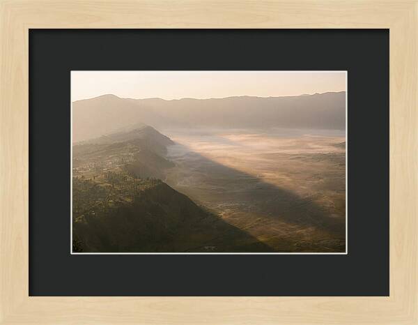 Mountain Shadow Stretching Across Valley